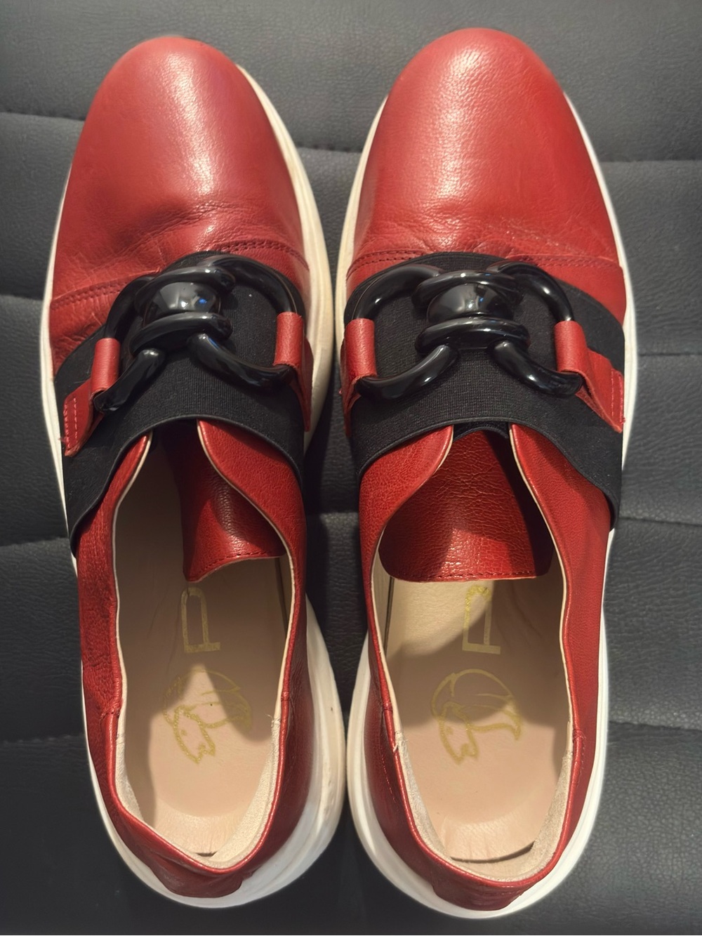 Prada Linea Rossa Red Leather Slip-On Sneakers with Black Chain Detail